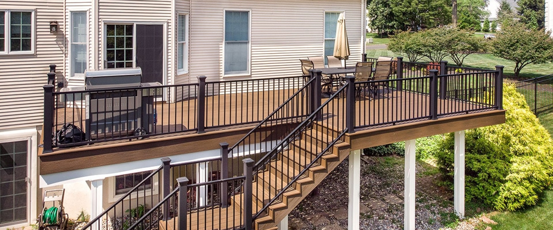 Maximizing Space on Your Deck: Tips and Tricks for Custom Decks, Siding, and Roofing